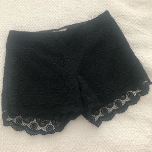 Black eyelet scallop shorts